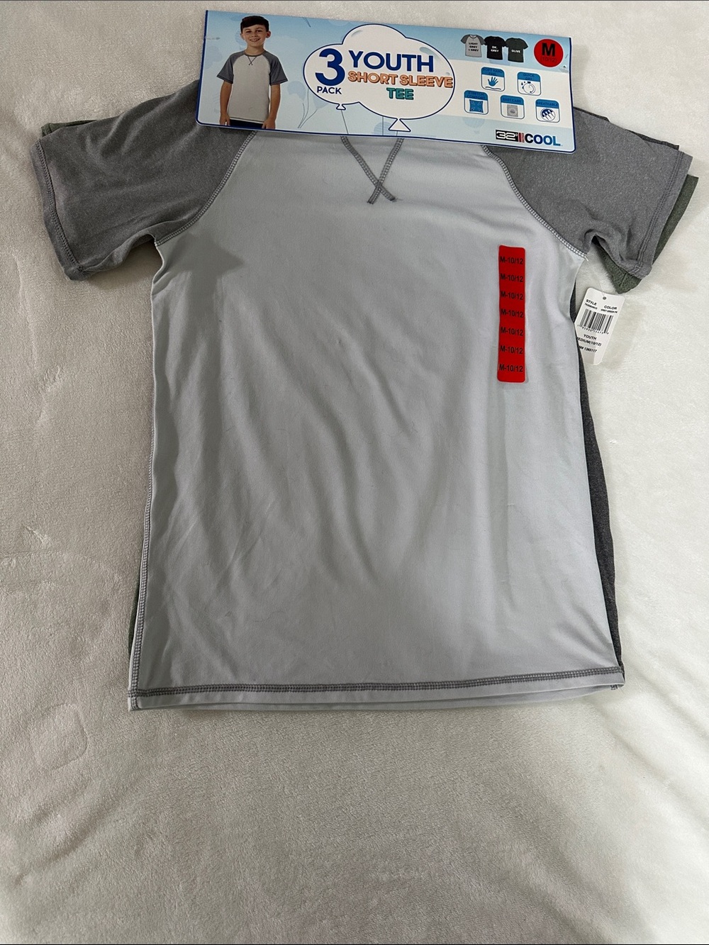 Bundle of 3 shirts. Light Gray, Dark Gray, And Green.
94% polyester, 6% spandex.